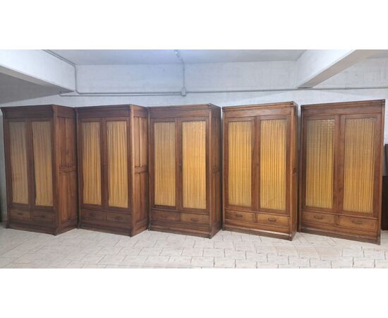 Set of five light walnut bookcases