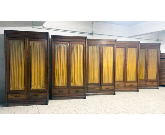 Set of five light walnut bookcases