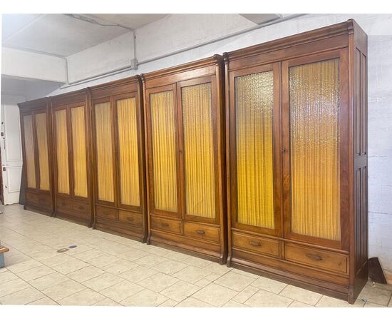 Set of five light walnut bookcases