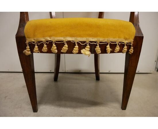 Antique armchair, early 1800s, with armrests