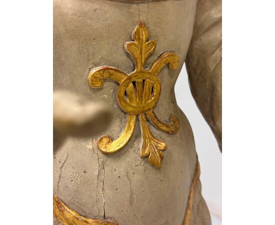 Winged angel in carved and gilded wood. Siena, 18th century. H 136 cm