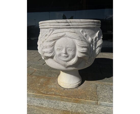 Sculpted marble vase