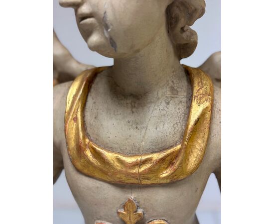 Winged angel in carved and gilded wood. Siena, 18th century. H 136 cm