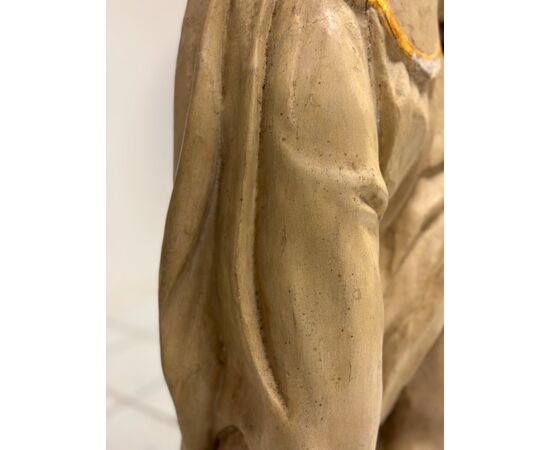 Winged angel in carved and gilded wood. Siena, 18th century. H 136 cm