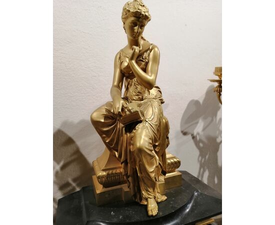 Gilt bronze clock and candelabra triptych, France, second half of the 19th century