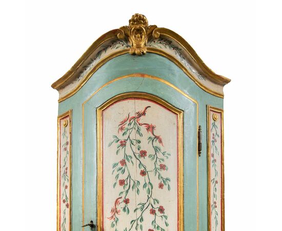 Pair of carved, lacquered and painted wooden corner cabinets. Piedmont, 18th century.