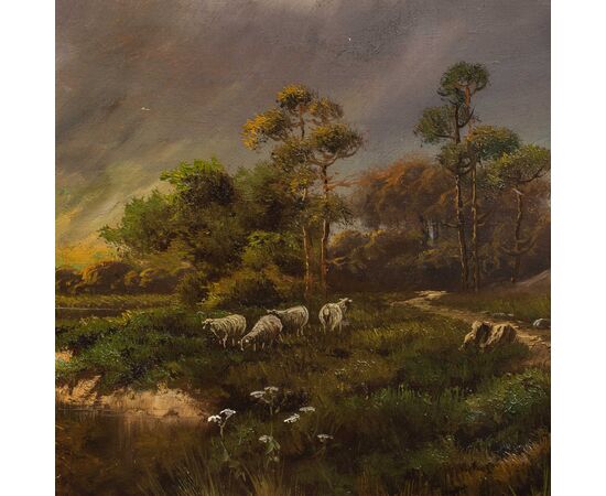 J. M. Ducker (British, early 20th century) - Mountain landscape with lake and sheep.