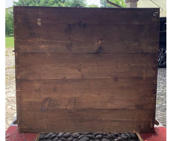 Walnut chest of drawers with drop-leaf. Italy, 18th century.