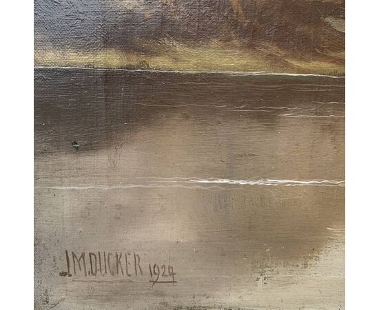 J. M. Ducker (British, early 20th century) - Mountain landscape with lake and sheep.