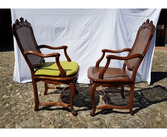 Four carved wooden armchairs. Lombardy, mid-18th century.