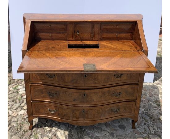 Walnut drop-front chest of drawers. Venice, second half of the 18th century.