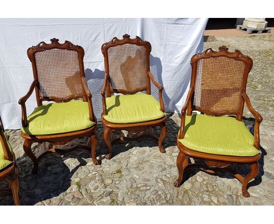 Four carved wooden armchairs. Lombardy, mid-18th century.