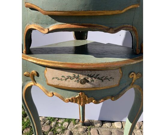 Pair of carved, lacquered and painted wooden corner cabinets. Piedmont, 18th century.