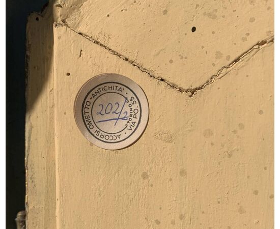 Pair of carved, lacquered and painted wooden corner cabinets. Piedmont, 18th century.
