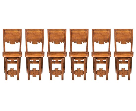 Six friar chairs in solid walnut. Friuli, 17th century.