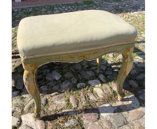 Armchair and footstool in carved and lacquered wood. Venice, 19th-20th century.
