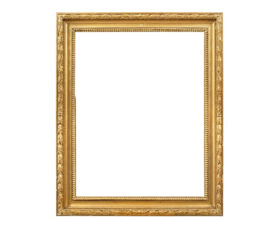 Empire style frame in carved and gilded wood. Italy, 19th century.