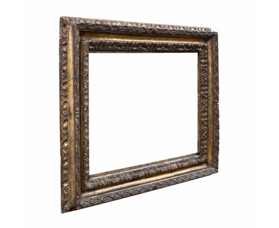 Carved and mecca-gilded wooden frame. Rome, late 17th century.