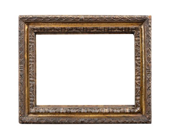 Carved and mecca-gilded wooden frame. Rome, late 17th century.