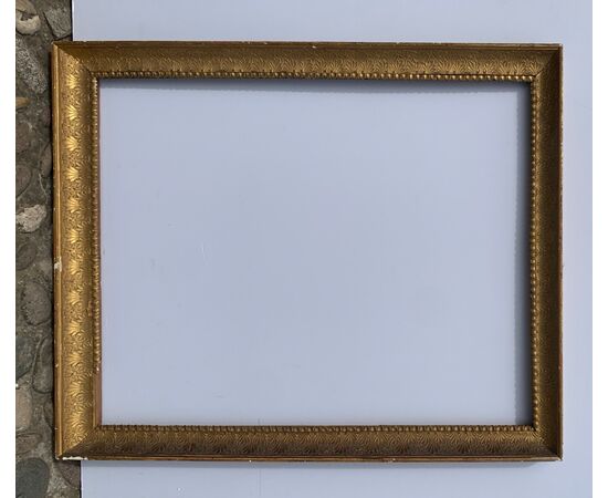 Neoclassical frame in carved and gilded wood. Italy, early 19th century.
