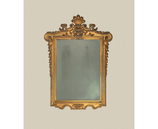 Carved and gilded wooden mirror, 19th century