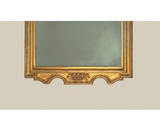 Carved and gilded wooden mirror, 19th century