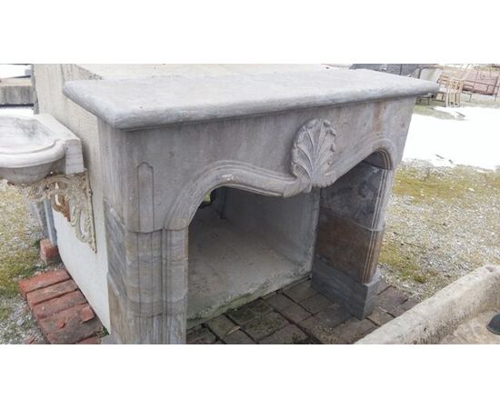 18th-century style stone fireplace