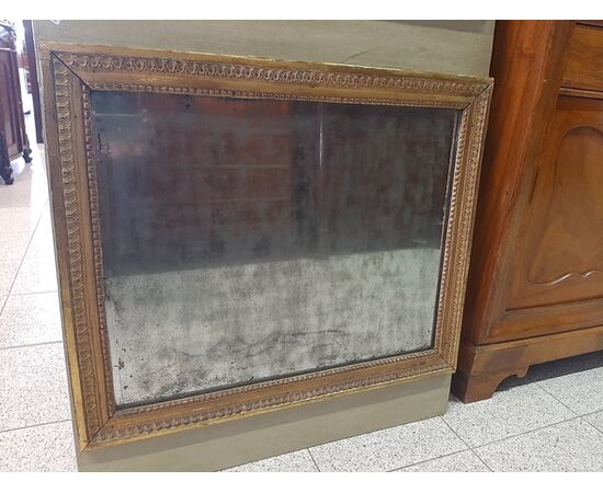 Decorated panel with canvas oil painting and mirror.