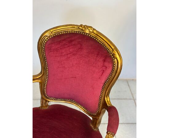 Pair of carved and gilded wooden armchairs. Lombardy, 19th century