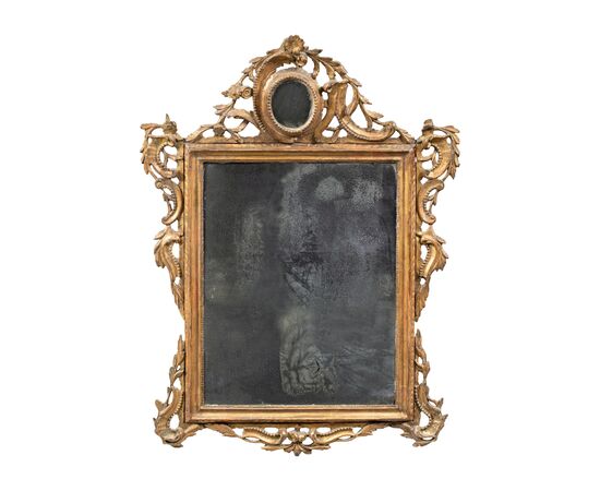 Carved and gilded wood mirror. Venice, 18th century.