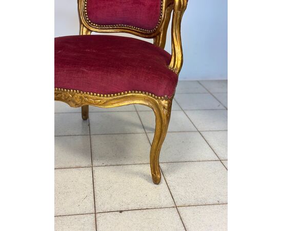 Pair of carved and gilded wooden armchairs. Lombardy, 19th century