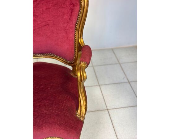 Pair of carved and gilded wooden armchairs. Lombardy, 19th century