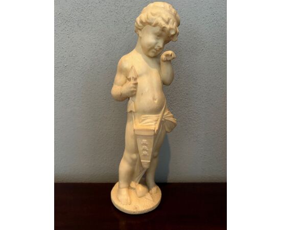 Marble sculpture depicting "AMOR"