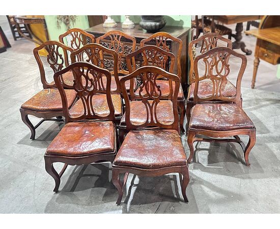 SET OF TEN LOUIS XV WALNUT CHAIRS, MID-18TH CENTURY