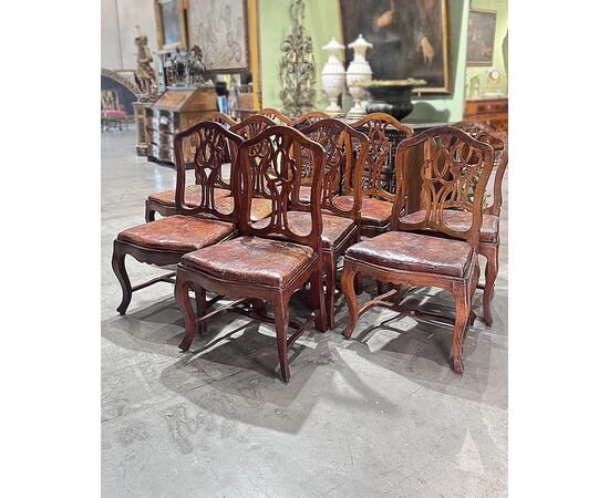 SET OF TEN LOUIS XV WALNUT CHAIRS, MID-18TH CENTURY