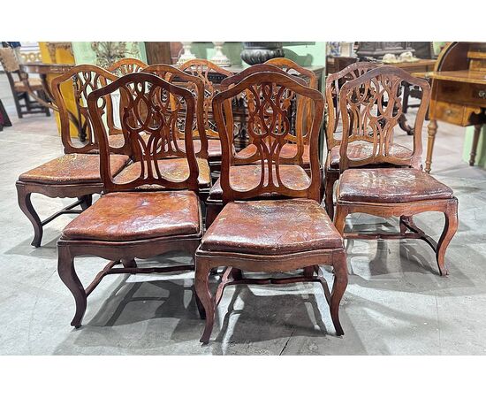 SET OF TEN LOUIS XV WALNUT CHAIRS, MID-18TH CENTURY