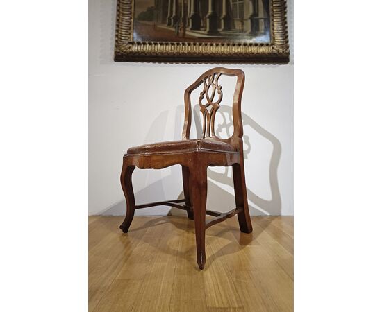 SET OF TEN LOUIS XV WALNUT CHAIRS, MID-18TH CENTURY
