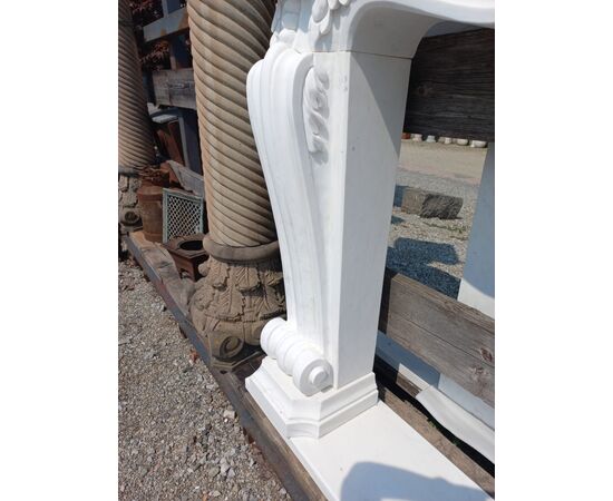 White marble fireplace surround