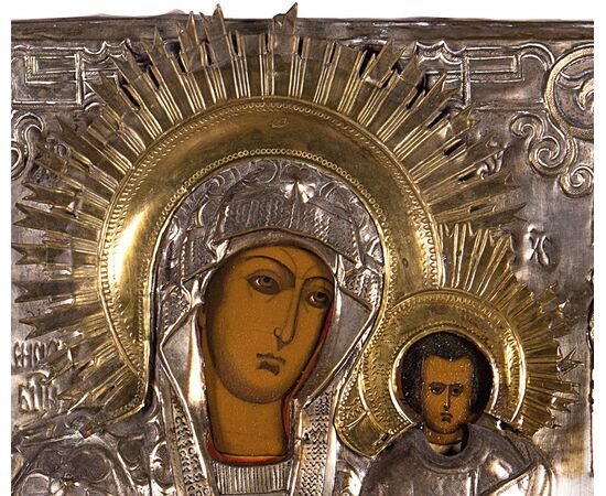 Icon depicting the Madonna and Child, painting on wood panel, embossed silver-plated copper Riza, 19th century