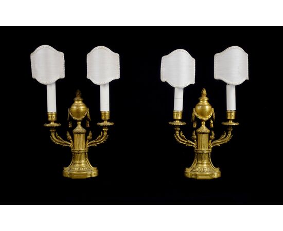 Pair of two-light candelabras in chiselled and gilded bronze, 19th century, Louis XVI style France