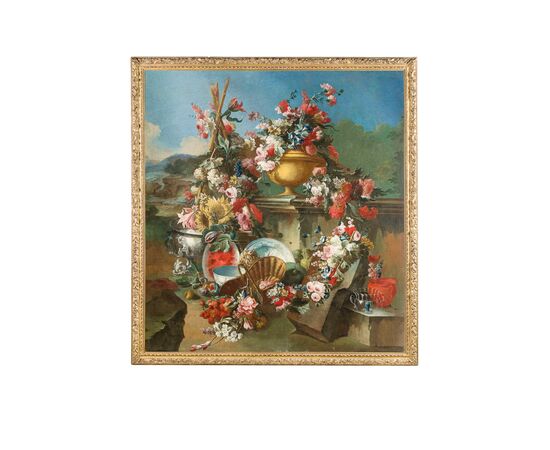 Francesco Lavagna (Naples 1684-1724), Sumptuous still life with a composition of flowers, watermelon, crockery and a garden in the background