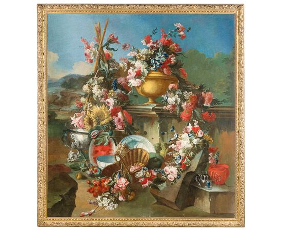 Francesco Lavagna (Naples 1684-1724), Sumptuous still life with a composition of flowers, watermelon, crockery and a garden in the background