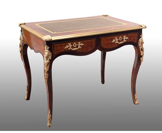 Antique French Napoleon III desk in precious exotic woods with gilded bronze inlays. 19th century period. Antique French Napoleon III desk in precious exotic woods with gilded bronze inlays. 19th century period.