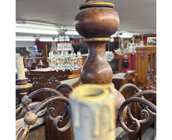 Antique 8-light chandelier, 1940s, turned wood and wrought iron. 90 cm diameter.