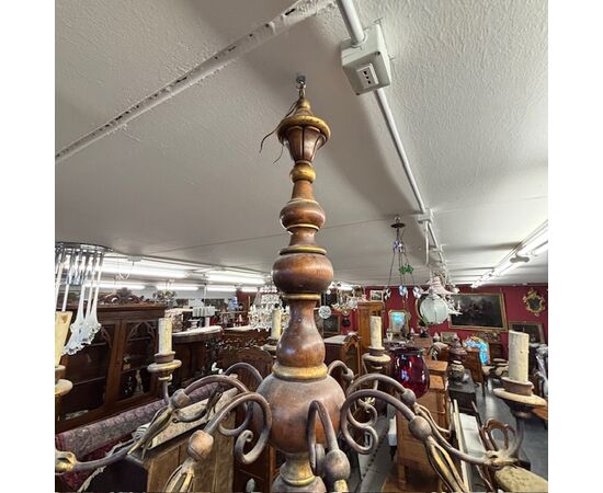 Antique 8-light chandelier, 1940s, turned wood and wrought iron. 90 cm diameter.