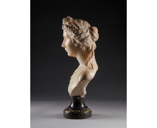 Marble bust of Ceres, Roman goddess of earth and fertility. White marble sculpture from the 17th century.