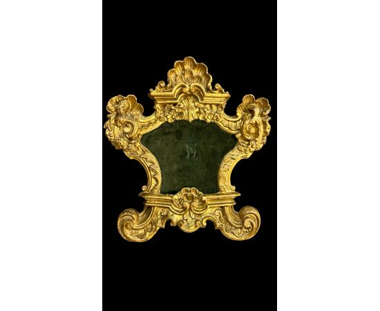 Pair of carved wooden cartaglorias with gold leaf.