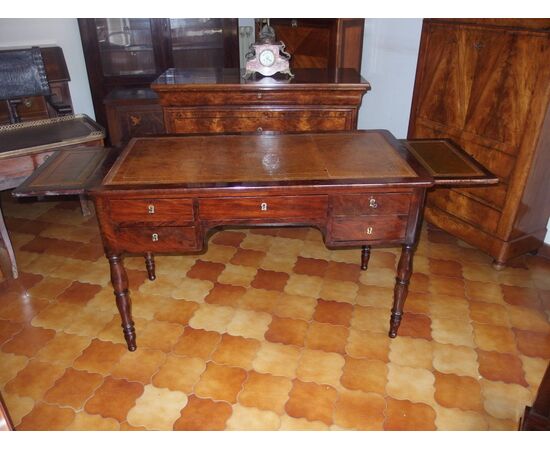 Flame mahogany center desk, mid-19th century Empire style, cm L129xP67xH80