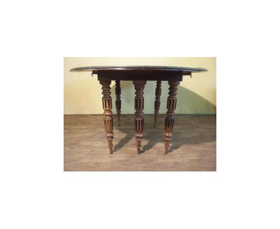 Louis Philippe style extendable walnut drop-leaf table, 19th century, L 129xW123xH75 cm