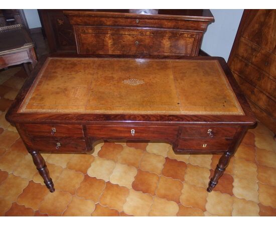 Flame mahogany center desk, mid-19th century Empire style, cm L129xP67xH80